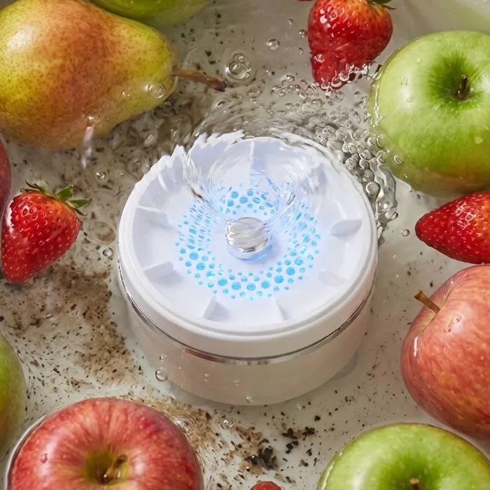 PuriEasy dropped into a bowl of water with fruits and vegetables